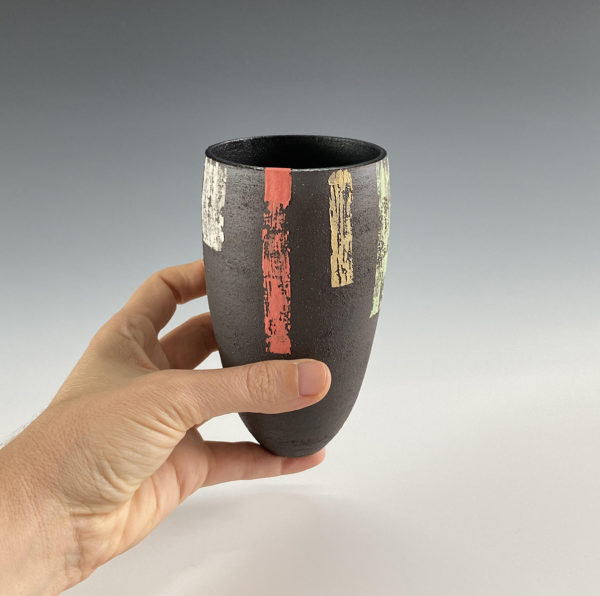 Black decorative vessel made by Ania Perkowska