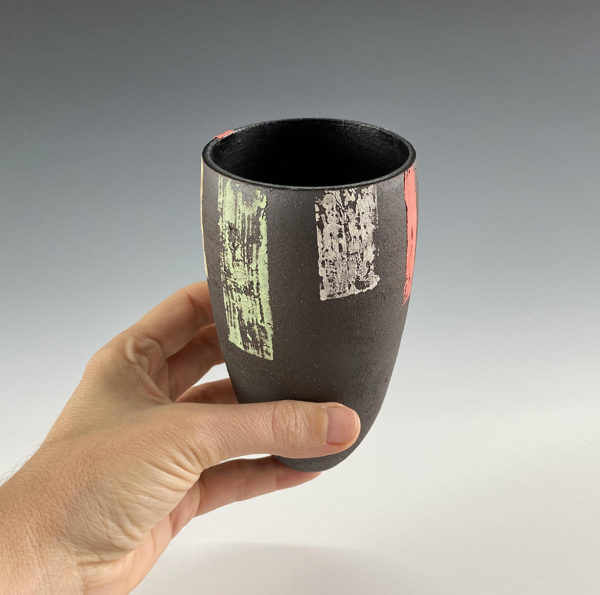 Black decorative vessel made by Ania Perkowska