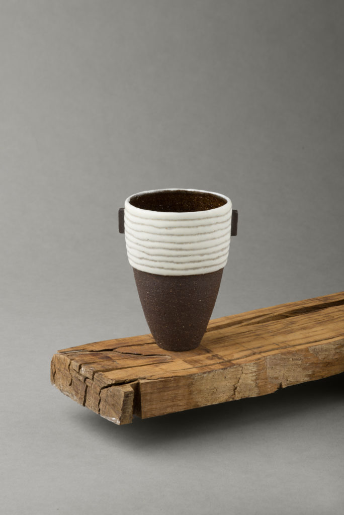 ania perkowska ceramics - black vessel with porcelain