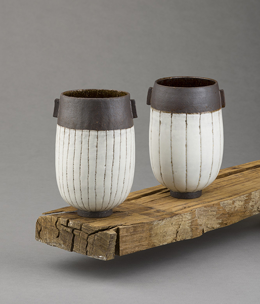 ania perkowska ceramics - black vessel with porcelain