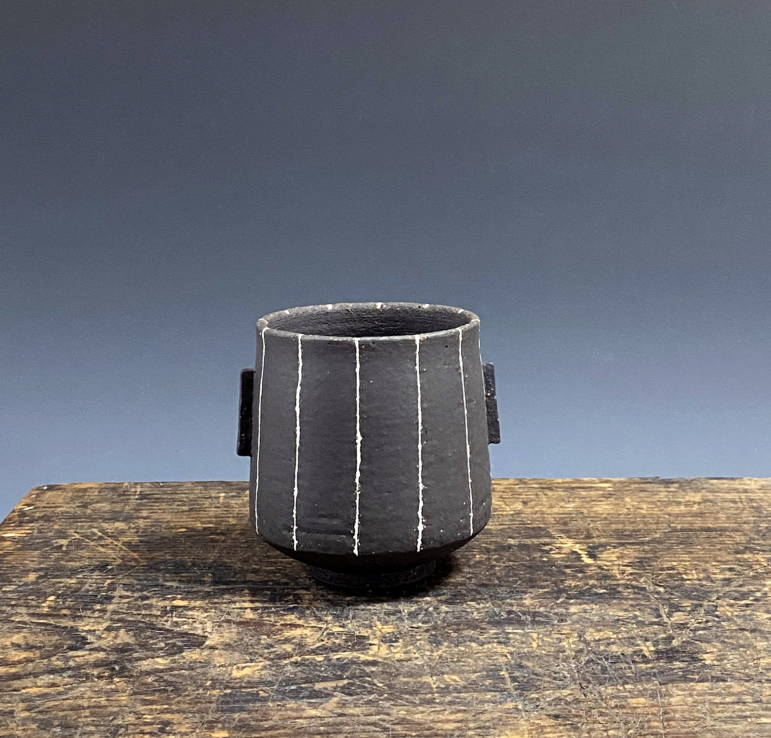 Black Vessel with pinstripes