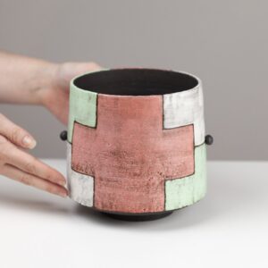 Black vessel with movable "handles"